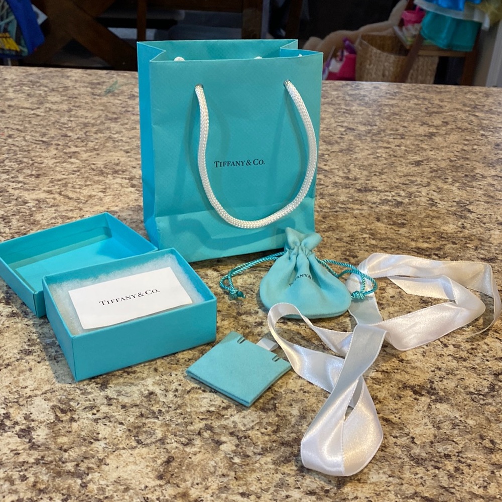 Empty Tiffany box, bag and small bag for jewelry. Ribbon included